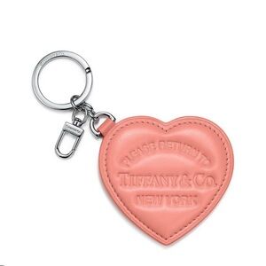 Tiffany & Co. Pink Heart Padded Bag Charm.